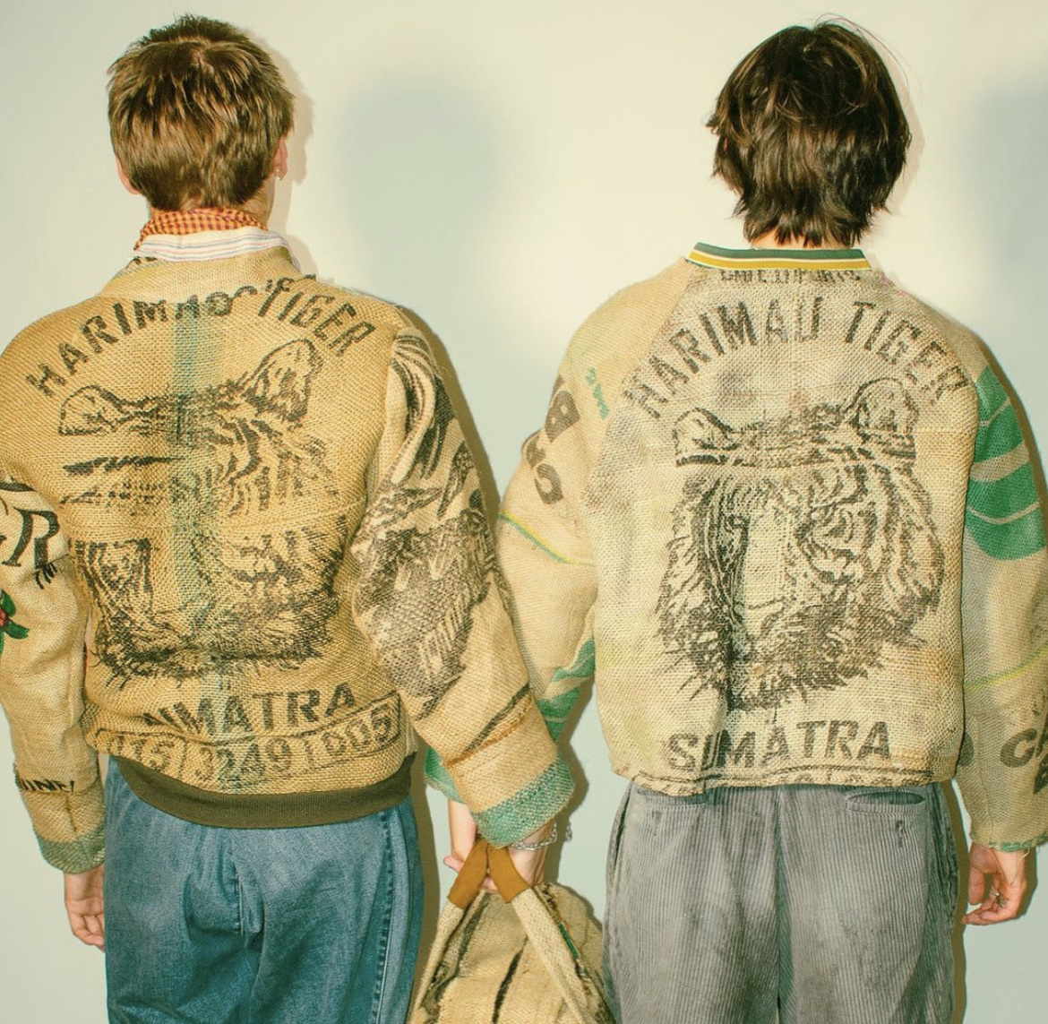 Two jackets seen from the back, printed Harimau Tiger Sumatra